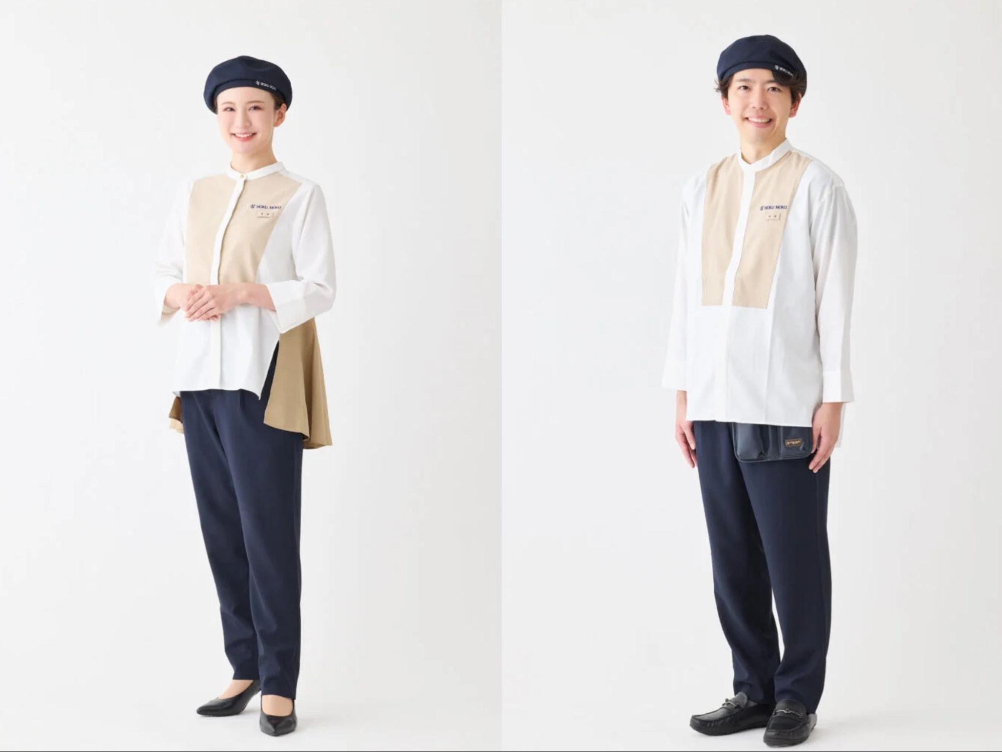 白とベージュ、黒の制服を着用した飲食店スタッフ